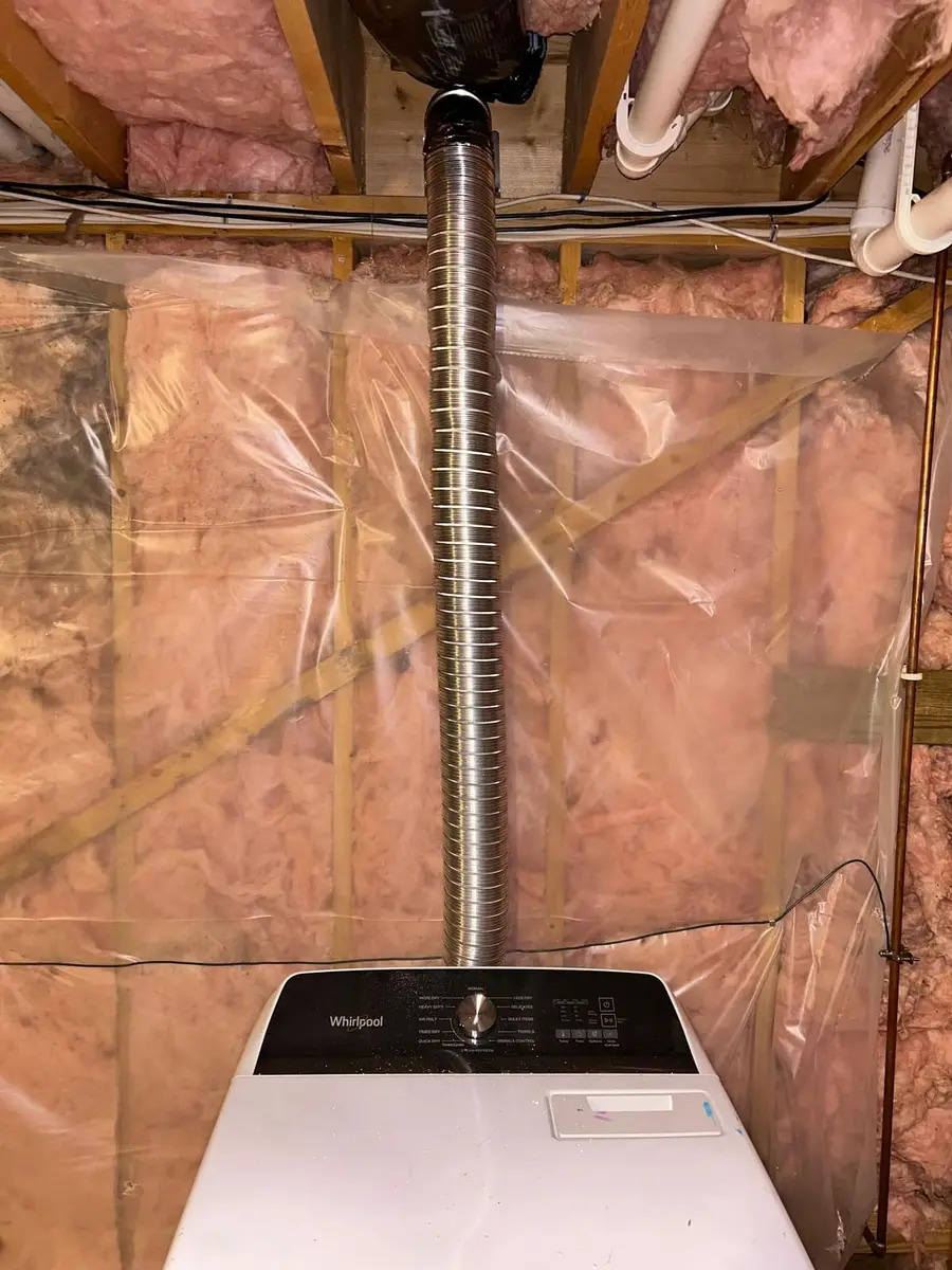Washer and dryer with vent run in the basement