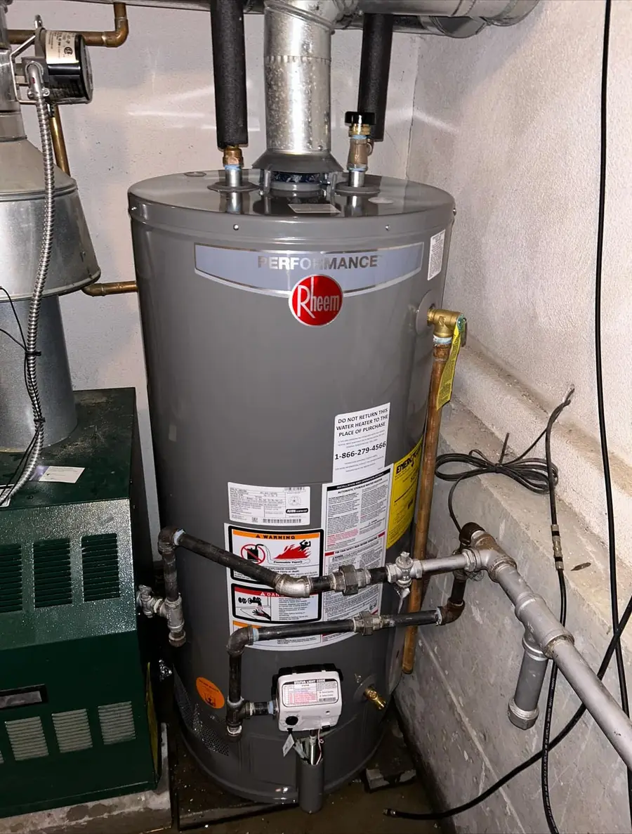 Close view of the new water heater and its gas piping