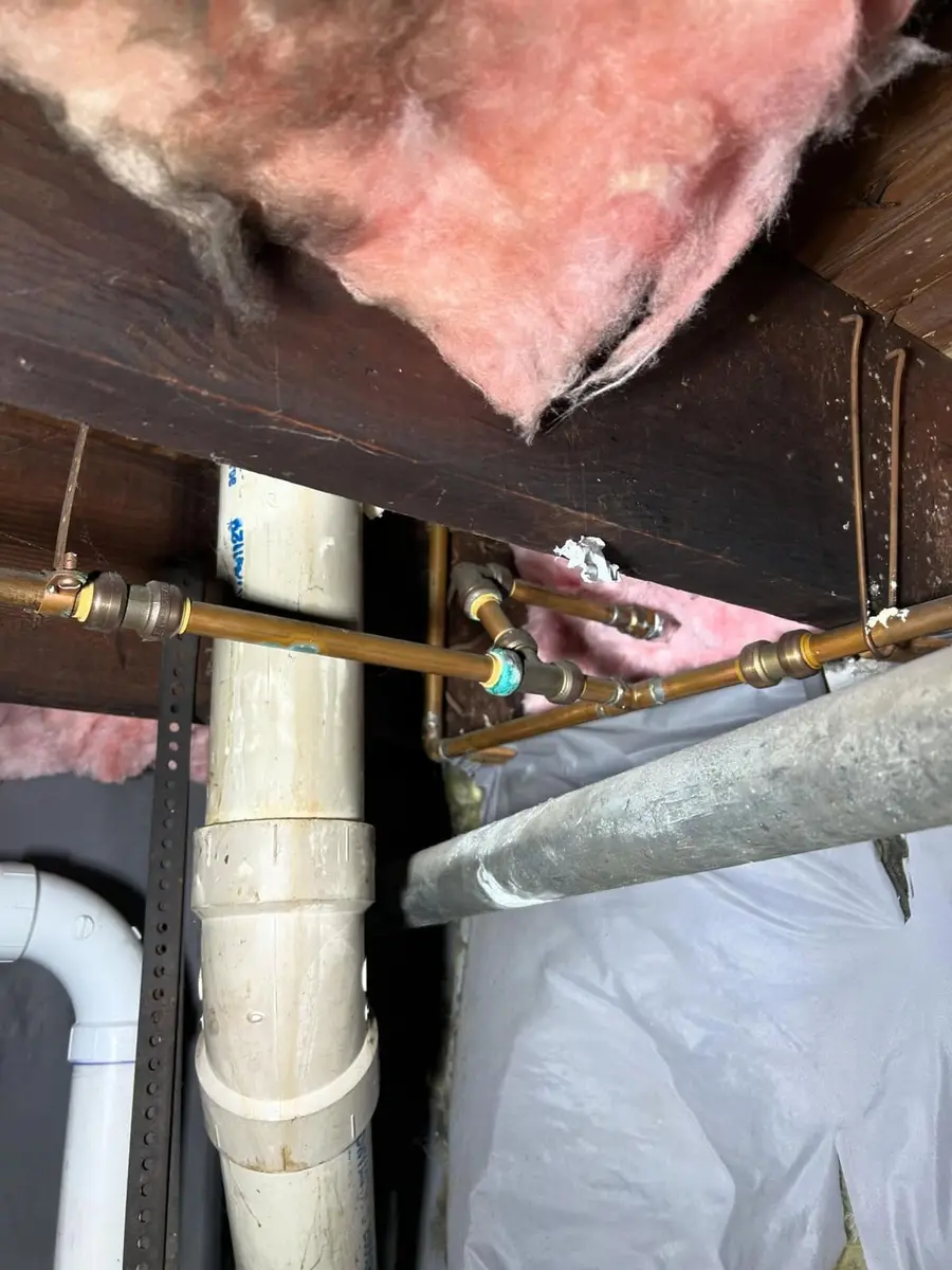 Repiped copper lines under the floor joists