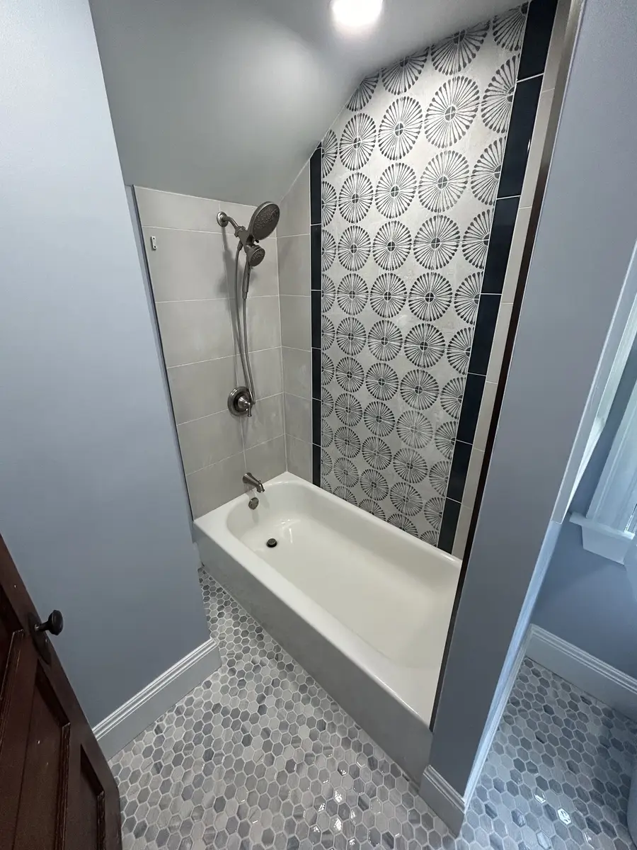 Pattern Tile Bath by S. Meredith Plumbing & Heating