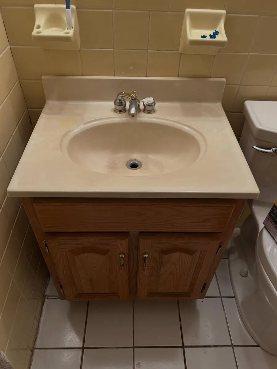 Old oak vanity before the swap, Peabody