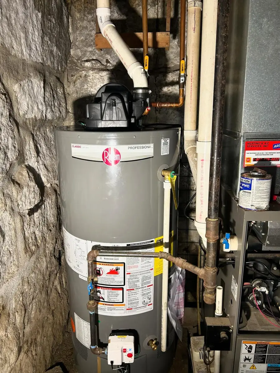 New 50-gallon power-vent water heater in the same spot