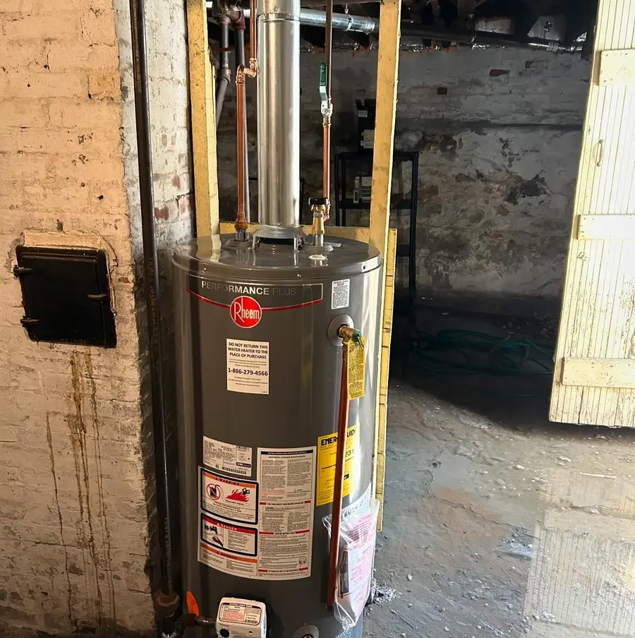 New gas water heater in a Revere basement
