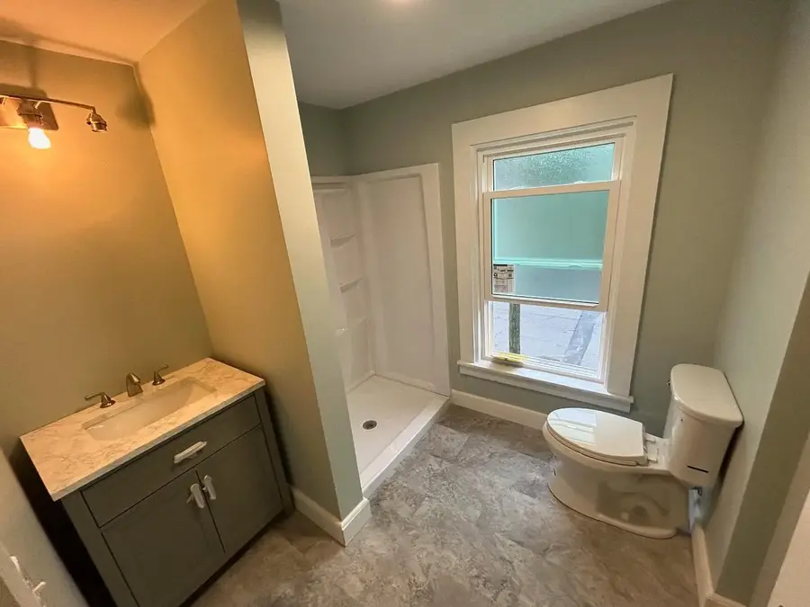 New second-floor bathroom with vanity and shower, Stoneham