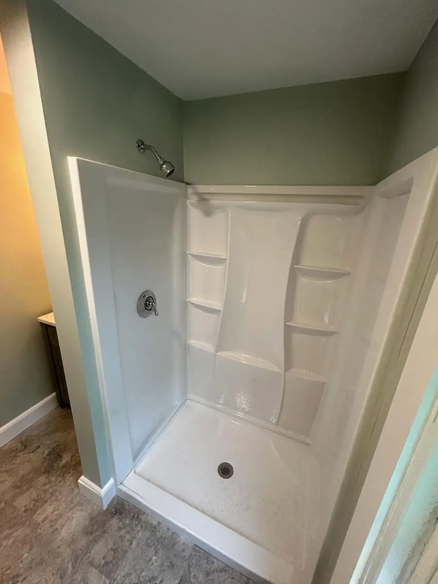 New shower stall in the added bathroom